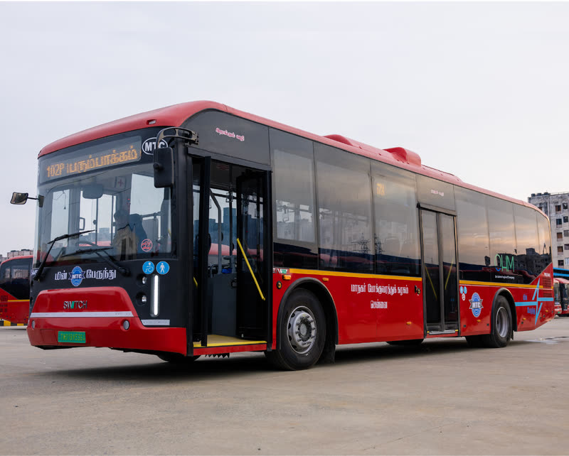 Full-size coach bus, exterior front three-quarter view